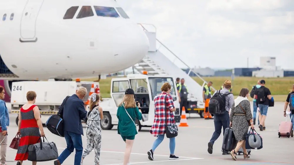 Pasażerowie na lotnisku w Jasionce - Foto: Maciej Terpiński / PLRzJ